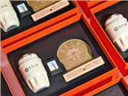 學(xué)校的文創(chuàng)伴手禮如何定制？集美大學(xué)的橙色禮盒滿是校園記憶